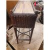 Image 3 : Vintage wicker planter box likely features a metal liner and is constructed in a style popular durin