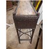 Image 4 : Vintage wicker planter box likely features a metal liner and is constructed in a style popular durin