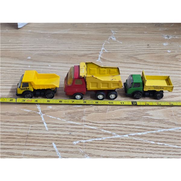 3 tonka toy dump trucks