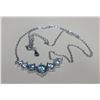 Image 3 : #1544-2.80 CT TW GRA CERTIFIED ROUND BRILLIANT CUT MOISSANITE STONES VVS BLUE COLOR SET WITH LARGER 