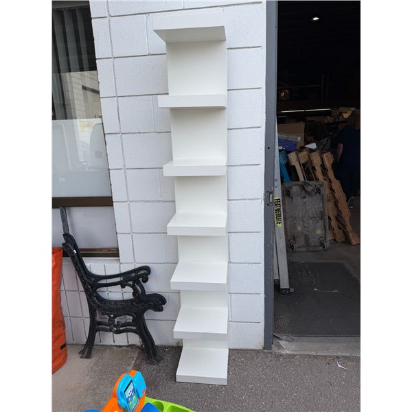 Shelf 11 and three-quarter inches by 11" x 75" tall