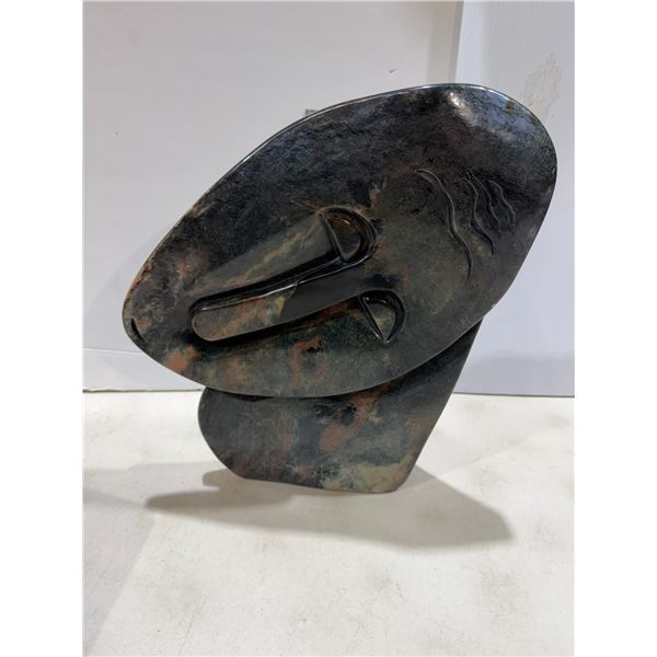 Heavy carving signed