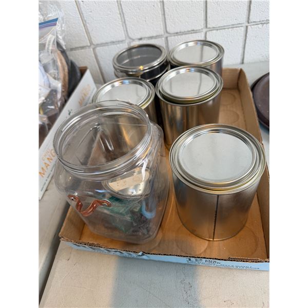 Empty tins and other items