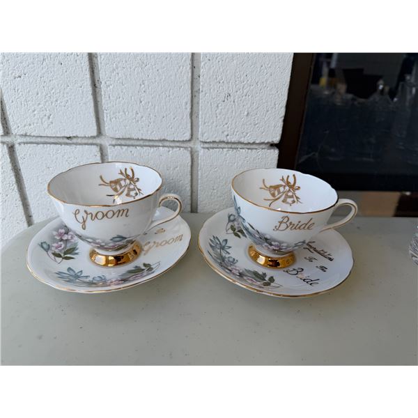 Bride and groom, Gladstone, teacup, and saucers