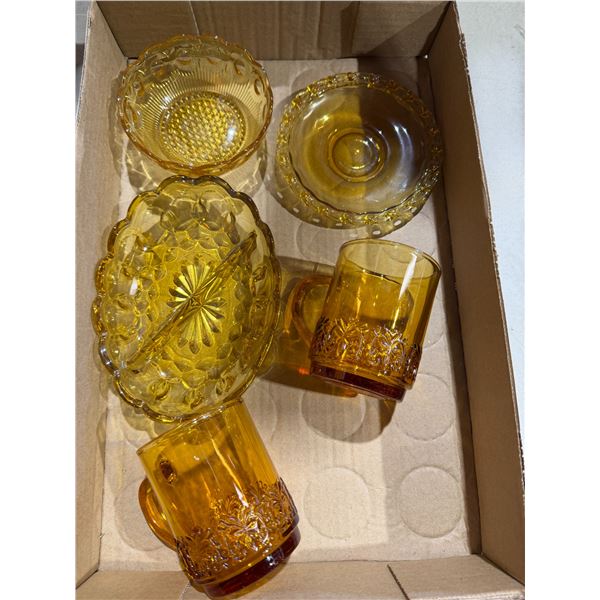 amber-colored glass items are vintage pieces from the Indiana Glass Company