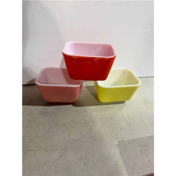 vintage Pyrex refrigerator dishes, specifically from the Primary Colors series.