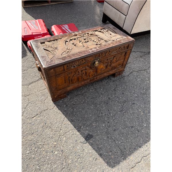 Carved trunk 32" x 14 1/2" x 16"