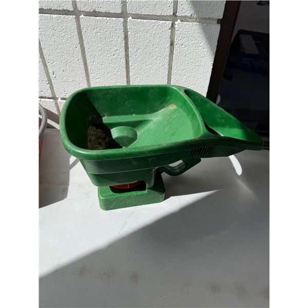 Handheld seed spreader