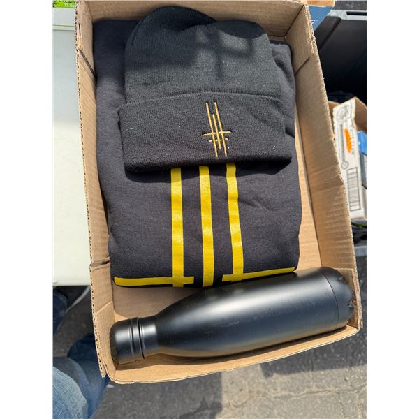 Toque T-shirt, and water bottle