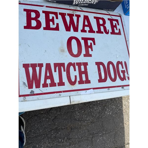 Be aware of dog tin sign