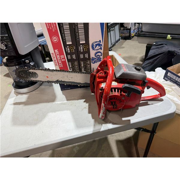 Homelite XL 12 Vintage Chainsaw.