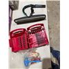 Image 1 : Tool bits, oil filter, wrench, and other items