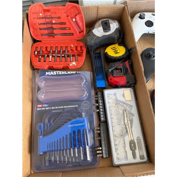Assorted tools, measuring tape, etc.