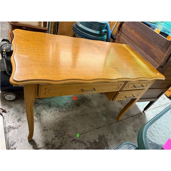 Desk measures 44 1/2" x 23 1/2" x 29 1/2" tall