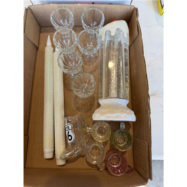 Candles, egg, cups, and shooter glasses