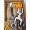 Image 1 : Files, tape measure, and other items