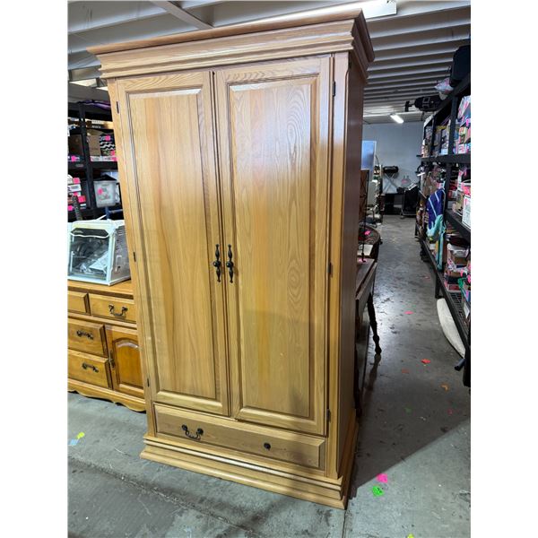 Armoire measures 41 1/2" x 22" x 75" tall