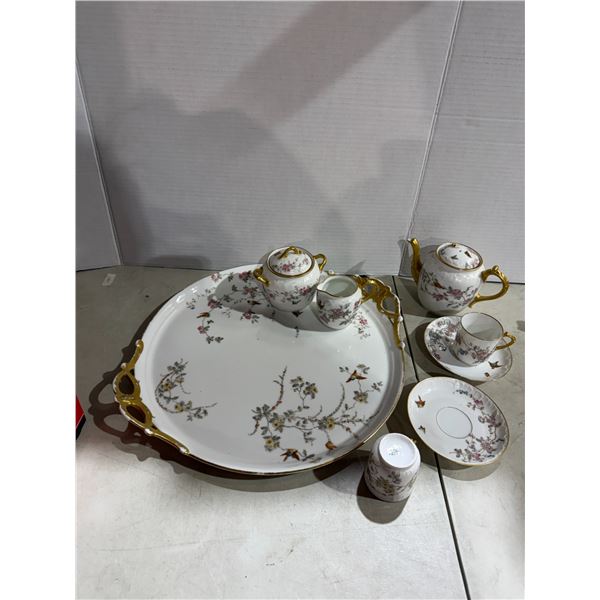 Dishes from France one has handle a broken seat