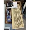 Image 1 : Computer, keyboard speakers, and other items