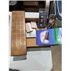 Image 1 : Crib, board deck, paper, flashlight, etc.