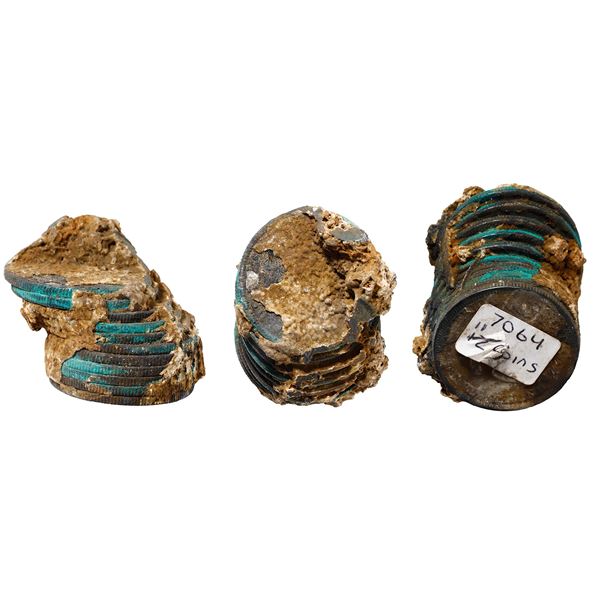 UNITED STATES, mints uncertain, clump of eleven seated Liberty half dollars, dates not visible, very