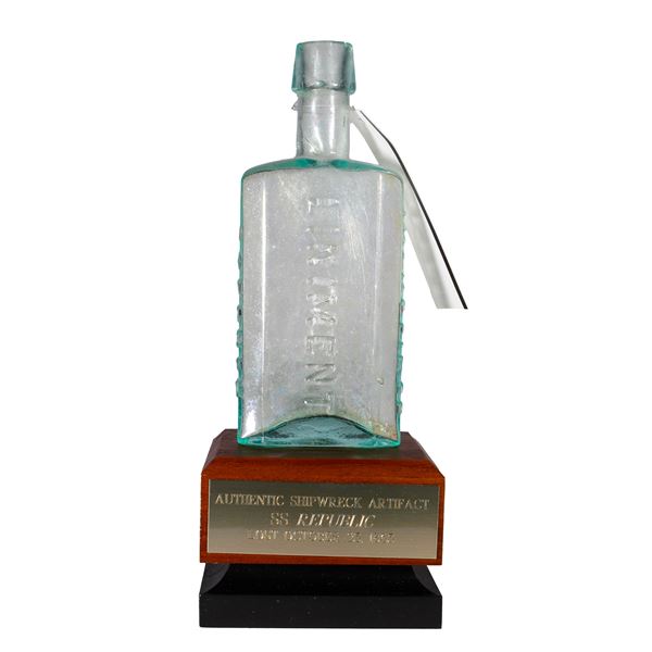 Stephen Sweet's infallible liniment glass bottle, with stand, ex-S.S. Republic (1865).