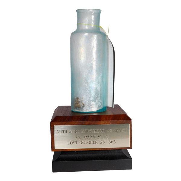 Small round glass medicine bottle, with stand, ex-S.S. Republic (1865).