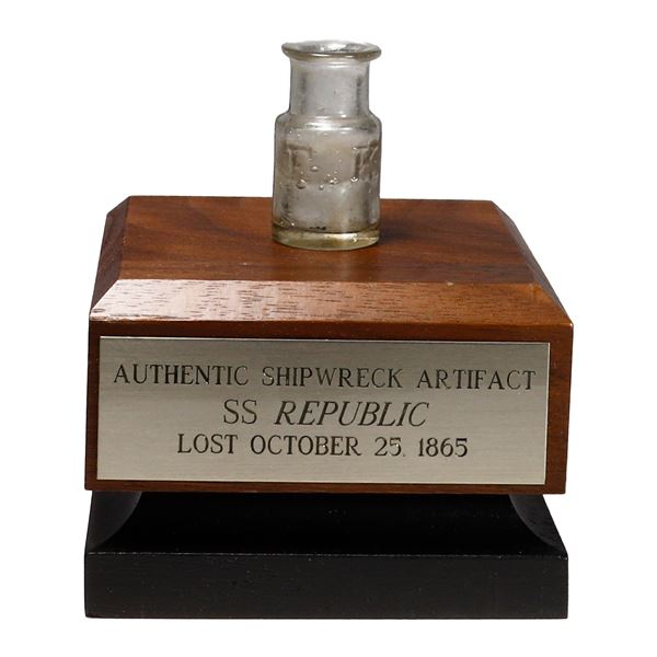 F.K. long neck glass pill bottle, with stand, ex-S.S. Republic (1865).