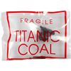 Image 1 : Small piece of coal recovered from the Titanic in 1994, certified as Object No. 94/0036.