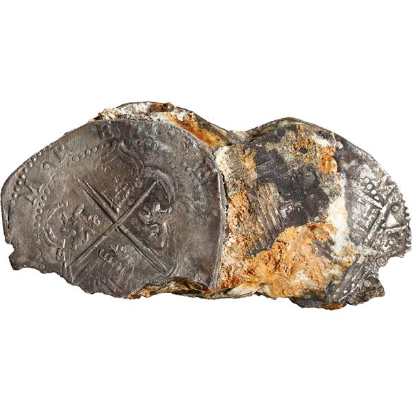 BOLIVIA, Potosí, clump of four cob 8 reales, Philip II, assayers not visible, encrusted as found.