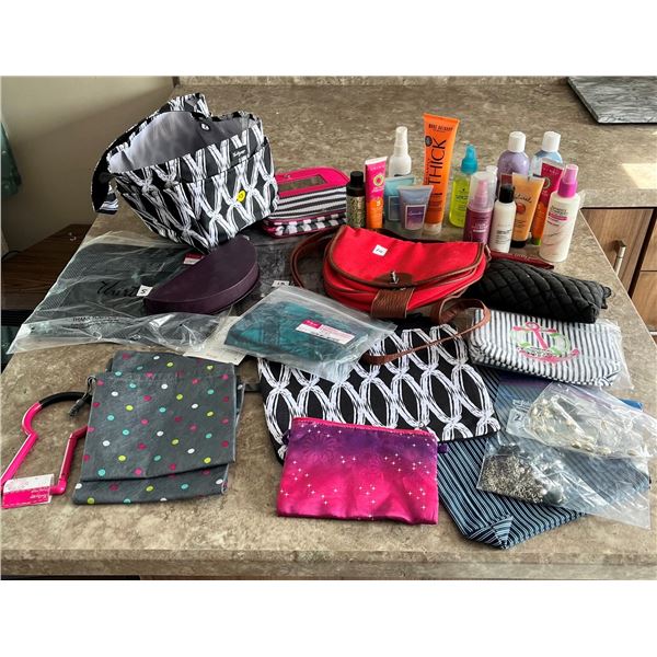 1001- Assorted lot of purses, bags and jewelry with hair and skin products (most likely expired)