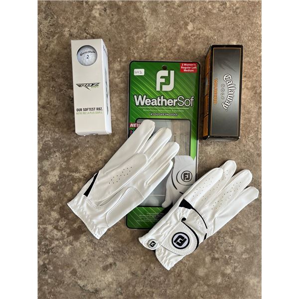 1012 - Women’s golf gloves (for left hand). New. Never used. (2 pair -size medium). With 2 