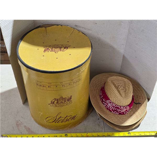 2 straw hats and stetson hat box
