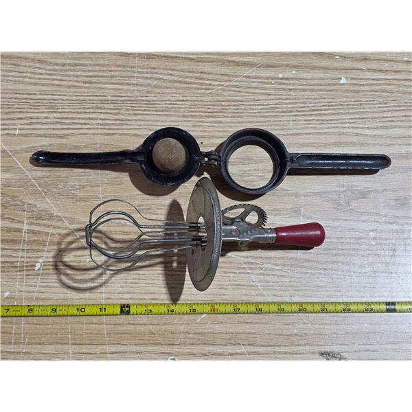 Antique nut cracker and egg beater