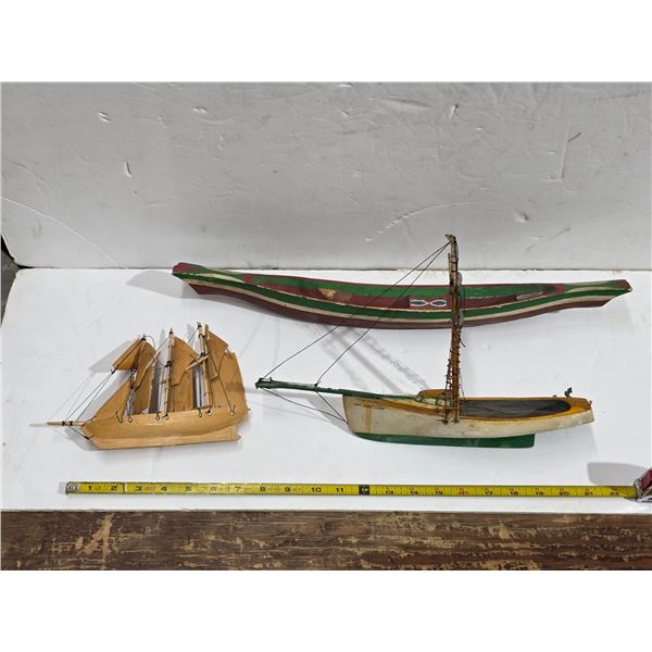 3 wooden hand crafted boats