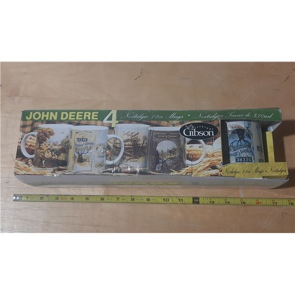 John Deere Nostalgic 11 oz Coffee Mug Set by Gibson, featuring four different agricultural-themed de