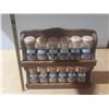Image 1 : Vintage Blue Ribbon wooden spice rack featuring 12 glass spice jars with spice. (One is Empty)