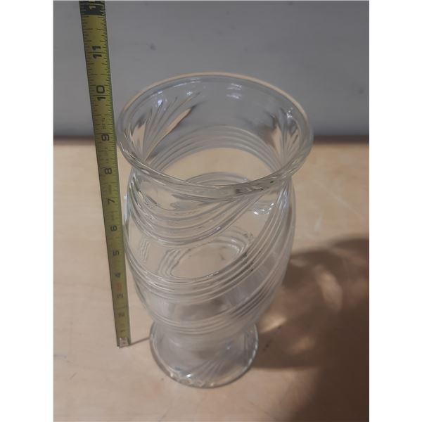 Vintage FTD clear glass vase featuring a spiral or swirl pattern.