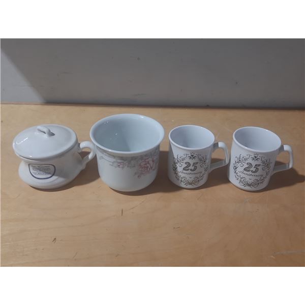 Vintage porcelain pieces, featuring a covered dish and two mugs celebrating a 25th anniversary.