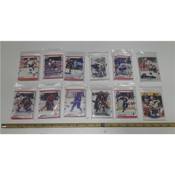 Lot of Assorted Hockey Cards Packs and (2) Other Sport Packs.