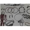 Image 3 : Vintage costume jewelry, including a variety of bracelets, earrings, and necklaces.