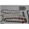Image 9 : Vintage costume jewelry, including a variety of bracelets, earrings, and necklaces.