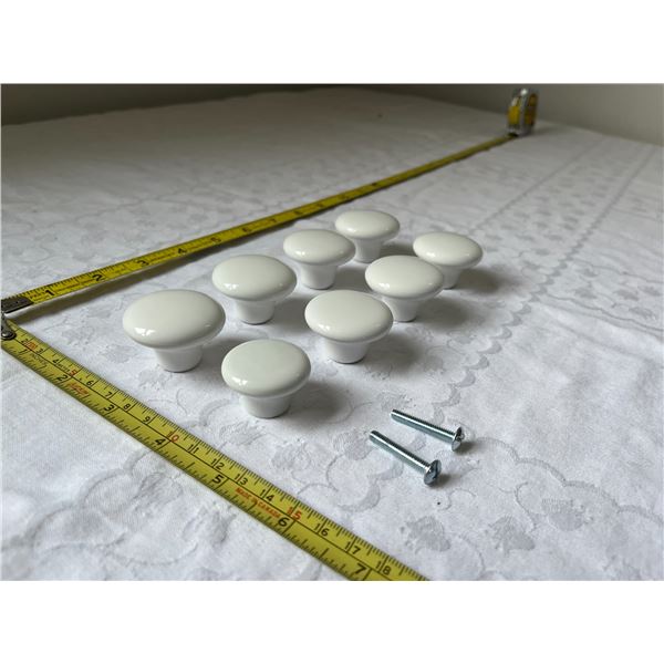 Vintage Porcelain Drawer Pulls. (7 @ 1 1/2'' wide x 1'' high and 1 @ 1 1/4'' wide x 7/8'' high)
