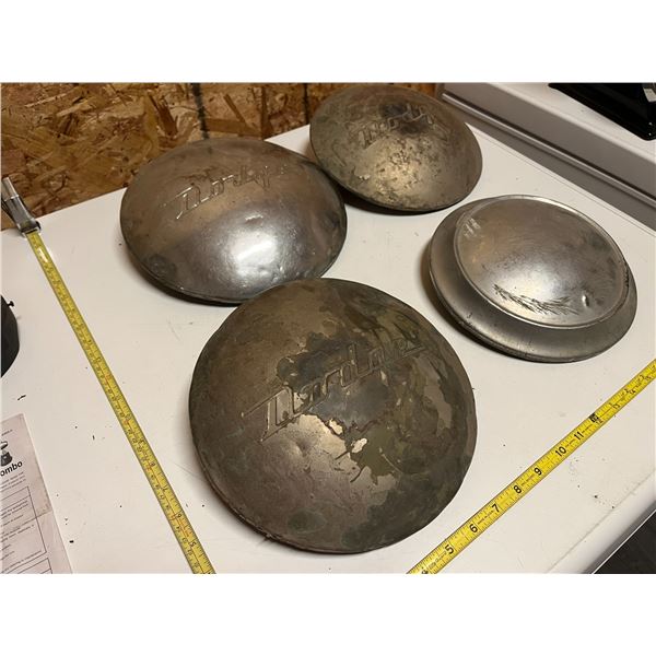 (3) Vintage Dodge hubcaps and 1 other hubcap