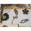 Image 2 : Bag full of Misc. Costume jewelry (Brooches) and etc. As Shown
