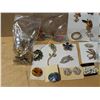 Image 5 : Bag full of Misc. Costume jewelry (Brooches) and etc. As Shown