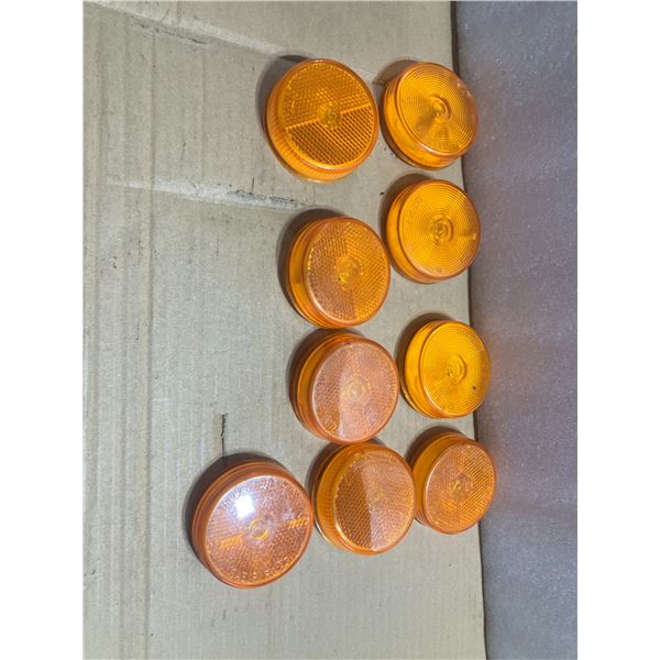 Nine 2 1/2" Amber Marker Lights
