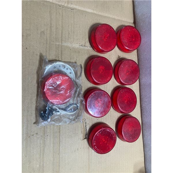 Nine 2 1/2" Red Marker Lights