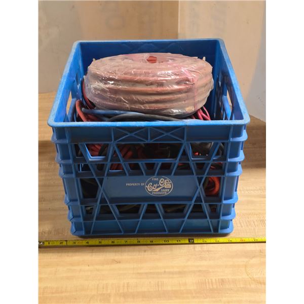 Crate full of extension cords