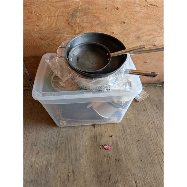 Clear Storage Tub Full of Pots, Pans, And Other Misc. Kitchen related Items